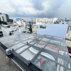 Mái kính xếp lớp sân thượng Quận 1